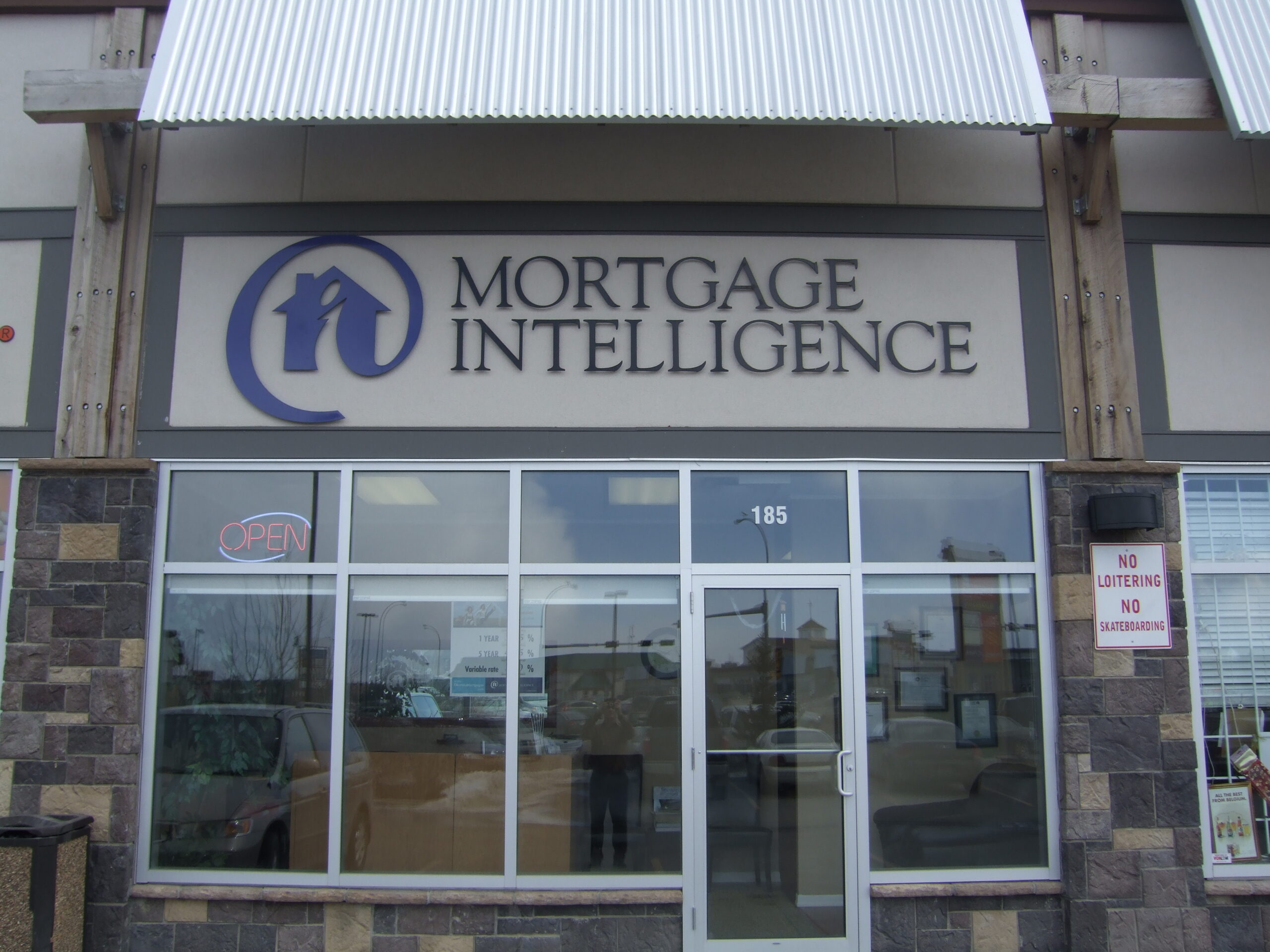 Mortgage Intelligence office storefront at 185 Southridge Drive, Okotoks — Shawn Selanders' first brokerage