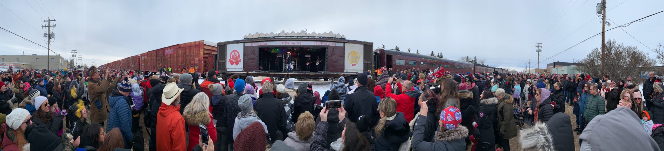 CP Holiday Train event in Okotoks, Alberta — thousands of community members gathering